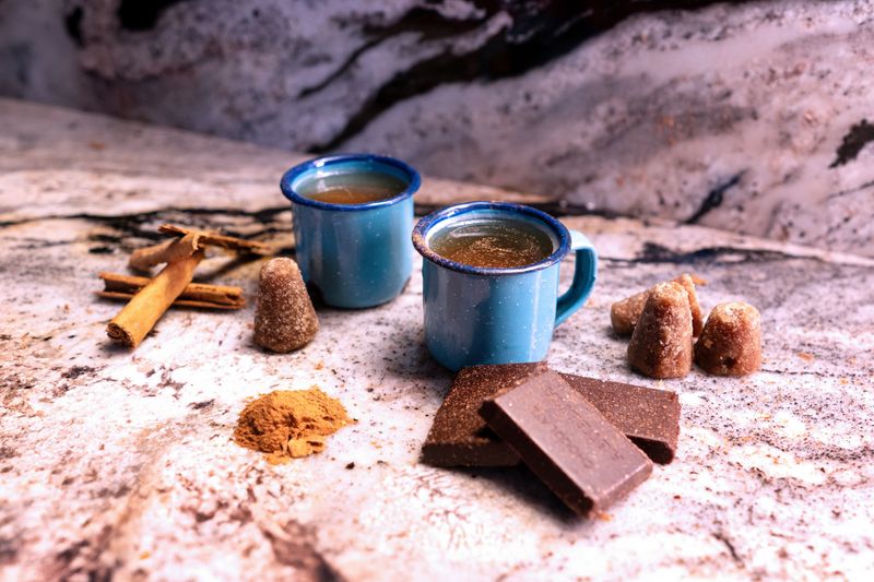 Golden churros with cinnamon sugar and chocolate dipping sauce
